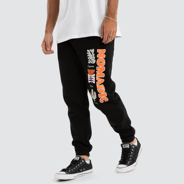 model wears Trial Tracksuit Pant Jet Black Trackpants Black - image 1