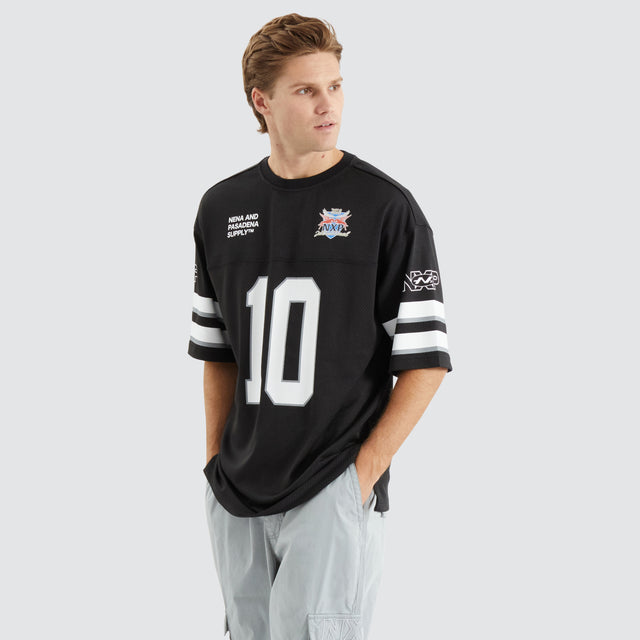 model wears Settler Football Jersey Jet Black T-Shirts Black - image 1