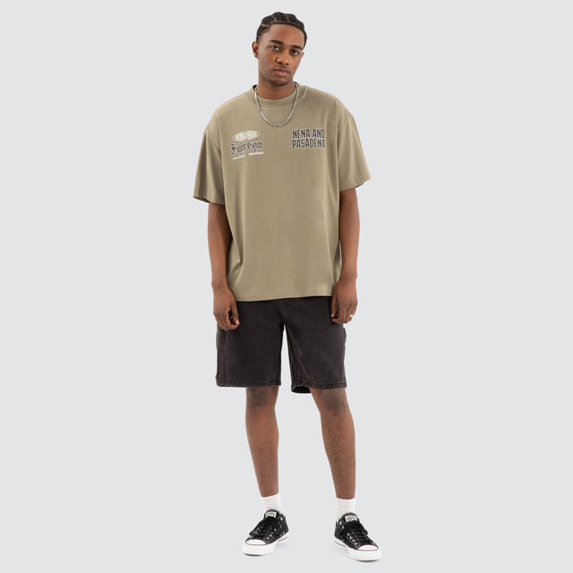 model wears Rattle Raptor Tee Khaki Green T-Shirts Green - image 2