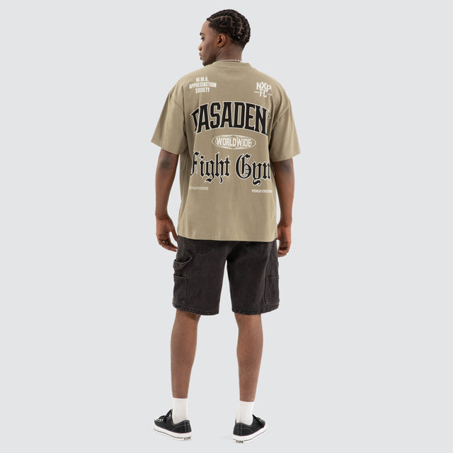 model wears Rattle Raptor Tee Khaki Green T-Shirts Green - image 4