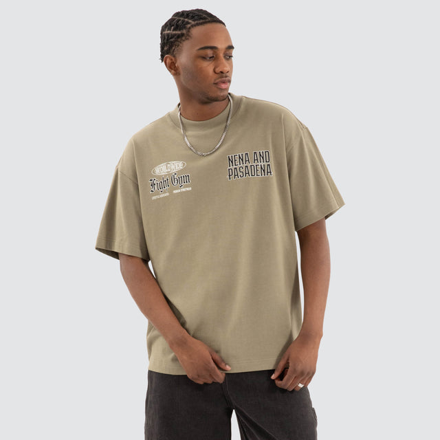 model wears Rattle Raptor Tee Khaki Green T-Shirts Green - image 3
