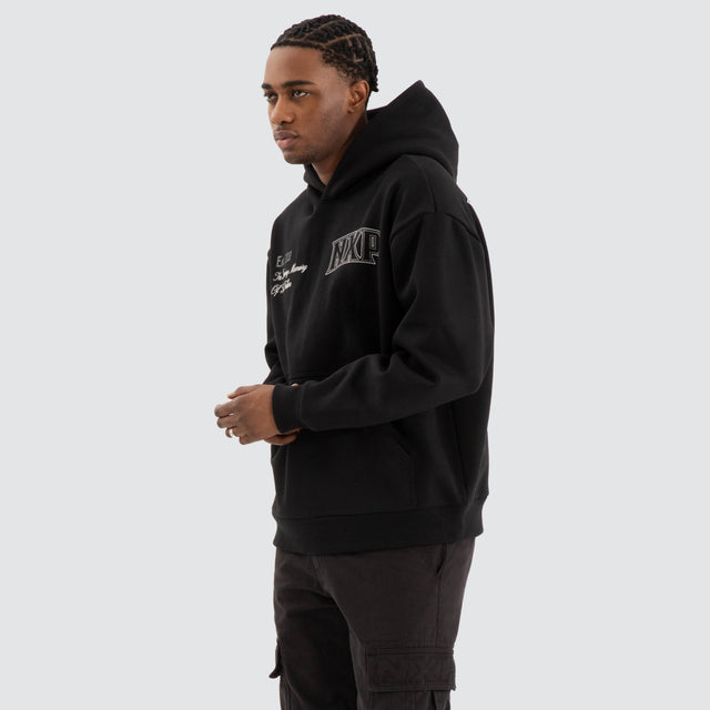 model wears Knockout Relaxed Hoodie Jet black Hoodies Black - image 5