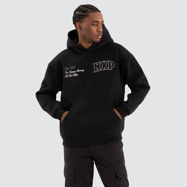 model wears Knockout Relaxed Hoodie Jet black Hoodies Black - image 3