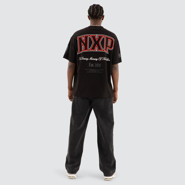 model wears Knockout Raptor Tee Jet Black T-Shirts Black - image 4