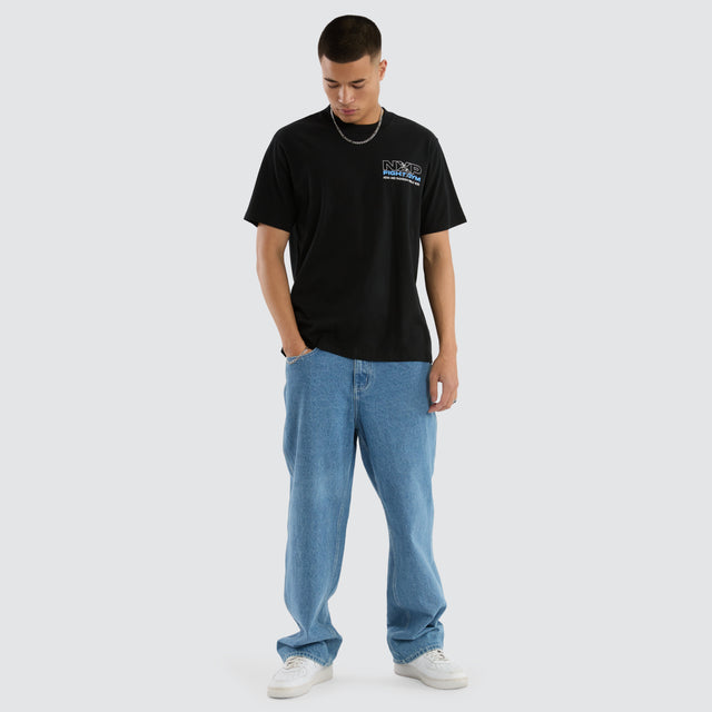 model wears Retrospect Classic Tee Jet Black T-Shirts Black - image 4