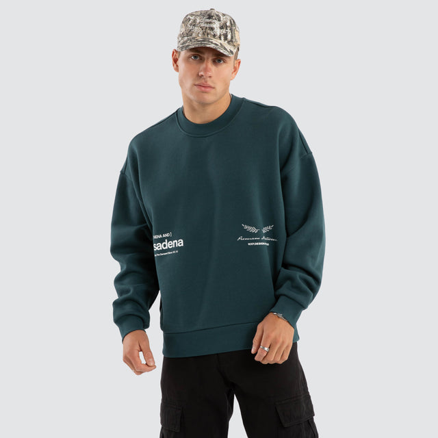 model wears Lectern Box Fit Sweater Sea Moss Jumpers Green - image 2