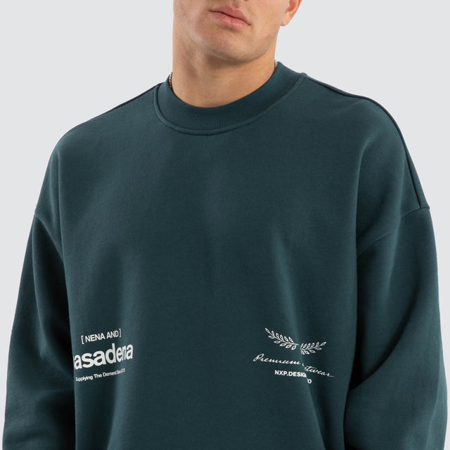 model wears Lectern Box Fit Sweater Sea Moss Jumpers Green - image 3