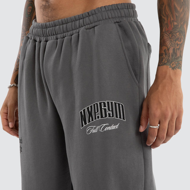model wears Wonder Baggy Trackpant Charcoal Trackpants Grey - image 3