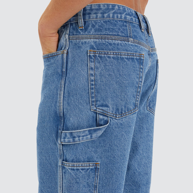 model wears Built Carpenter Jort Shorts Clean Blue Shorts Blue - image 2