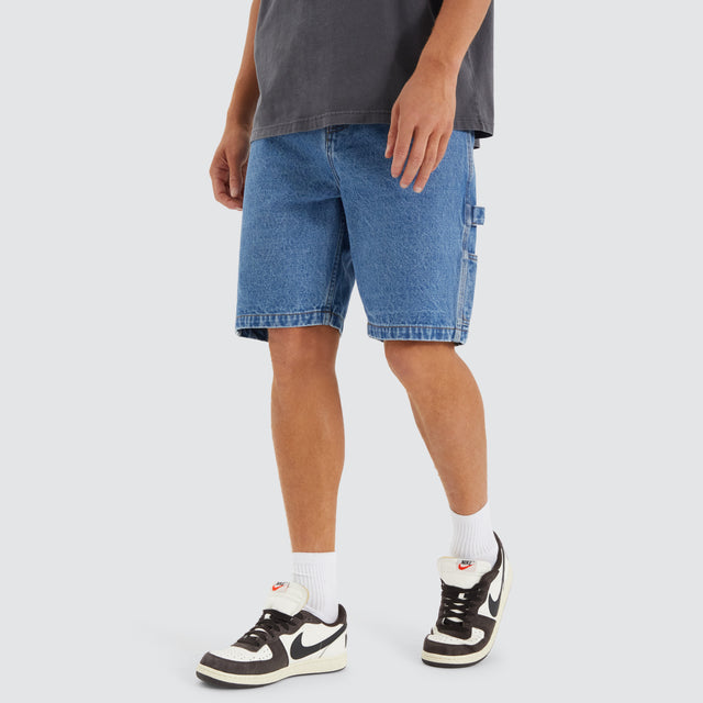 model wears Built Carpenter Jort Shorts Clean Blue Shorts Blue - image 1