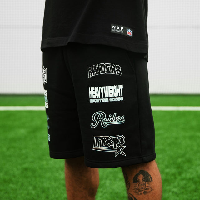 model wears Las Vegas Raiders NFL Shorts Jet Black Shorts Black - image 2