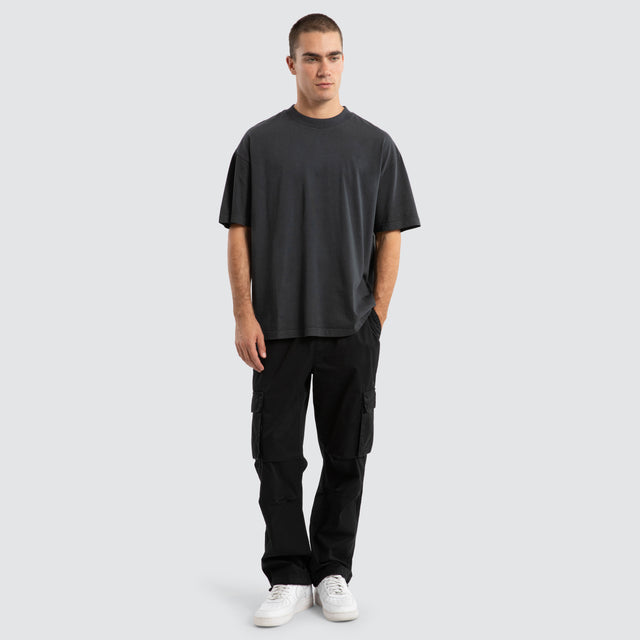 model wears P350 Parachute Cargo Pant Jet Black Pants Black - image 3