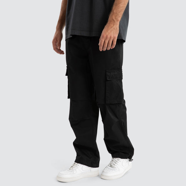 model wears P350 Parachute Cargo Pant Jet Black Pants Black - image 1