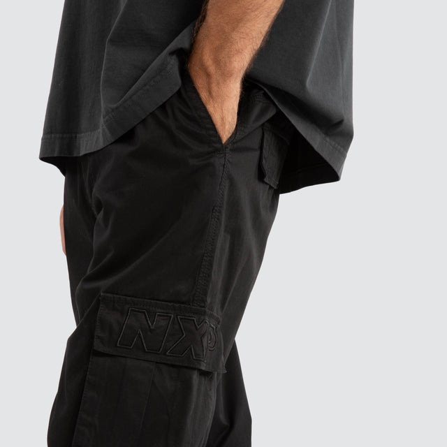 model wears P350 Parachute Cargo Pant Jet Black Pants Black - image 5