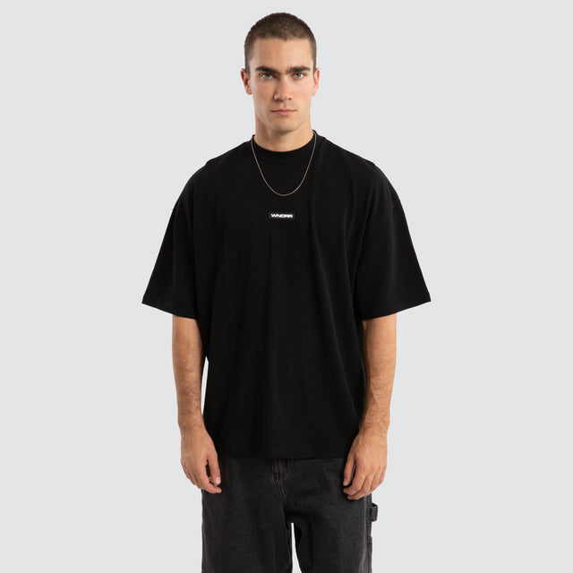 model wears Patron Heavy Weight Tee Black T-Shirts Black - image 2