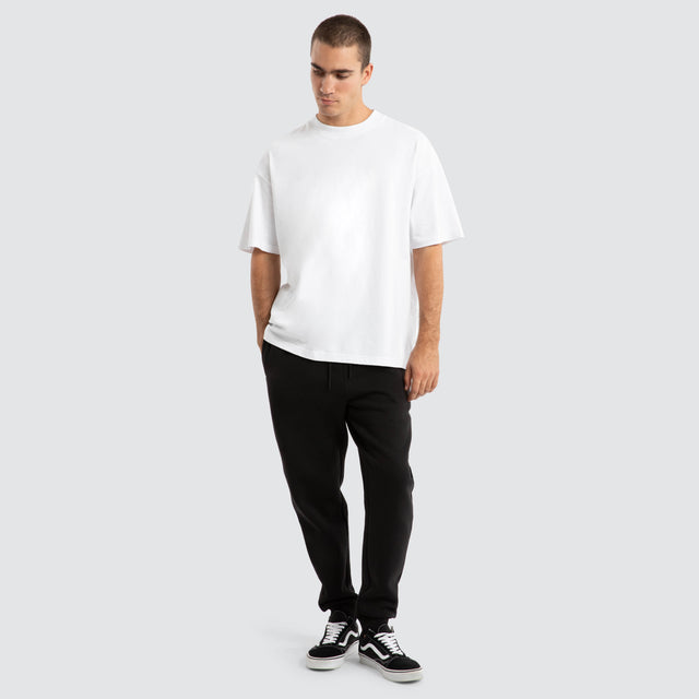 model wears Supply Skinny Trackpant Jet Black Trackpants Black - image 2