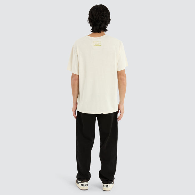 model wears Hemp Transformation Merch Tee Unbleached White T-Shirts Off-White - image 2