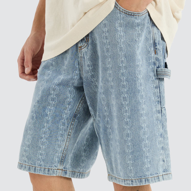 model wears Chain Reaction Slacker Jorts Faded Rinse Indigo Shorts Blue - image 2