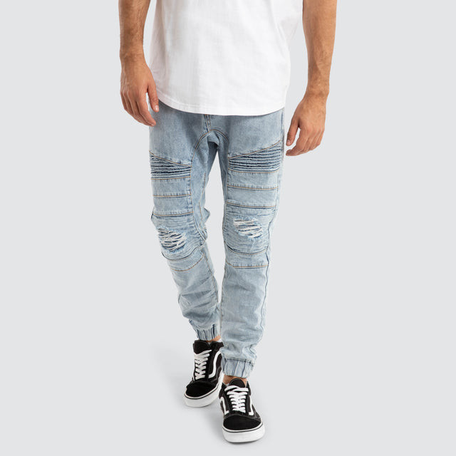 model wears Viper Denim Jogger Portland Blue Pants Blue - image 1