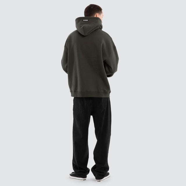 model wears Minted Relaxed Hoodie Ink Jumpers Green - image 2