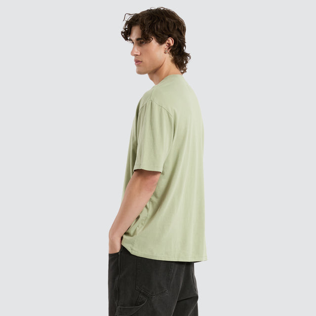 model wears Sun Orb Slacker Tee Green T-Shirts Green - image 6