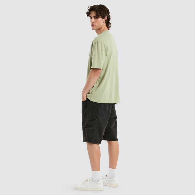 model wears Sun Orb Slacker Tee Green T-Shirts Green - image 2