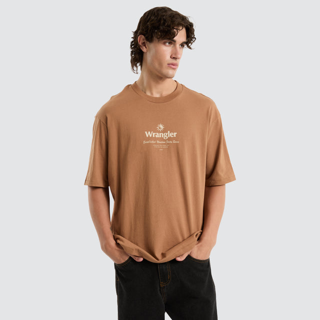 model wears 90s Vacay Slacker Tee Brown T-Shirts Brown - image 1