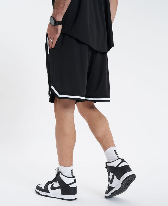model wears Banner Basketball Shorts Black Shorts Black - image 3