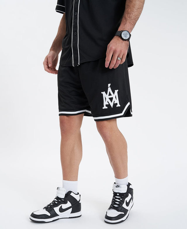 model wears Banner Basketball Shorts Black Shorts Black - image 1