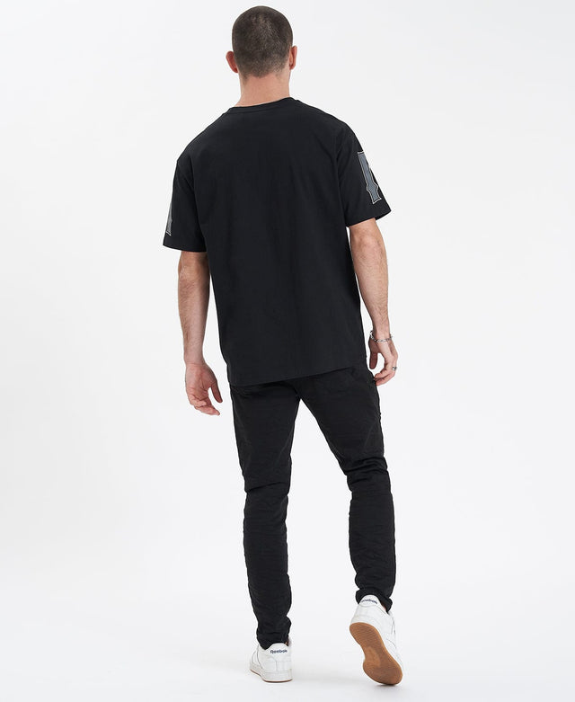 model wears Bond Box Fit T-Shirt Jet Black T-Shirts Black - image 5