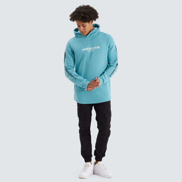 model wears Norge Heavy Dual Curved Hoodie Porcelain Blue Hoodies Blue - image 5