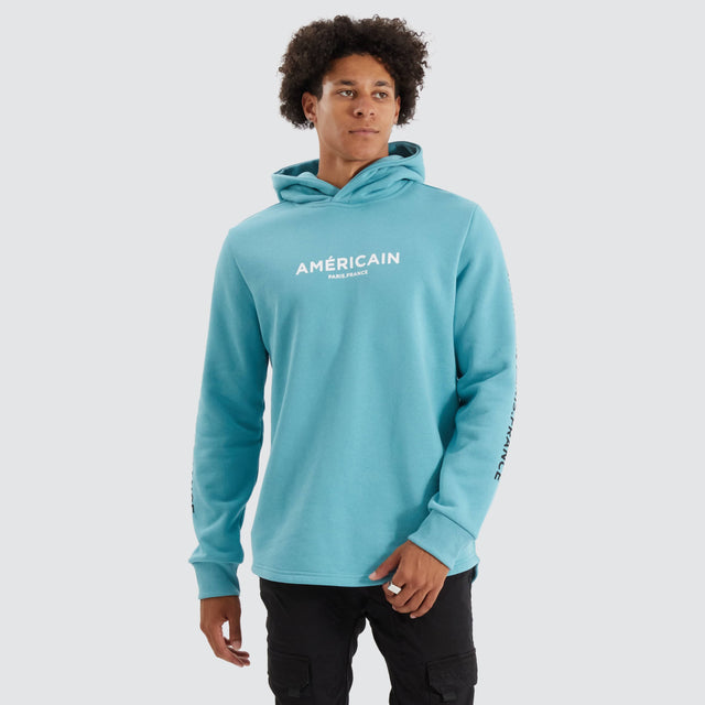 model wears Norge Heavy Dual Curved Hoodie Porcelain Blue Hoodies Blue - image 3