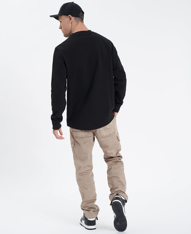 model wears Reap Dual Curved Jumper Jet Black Jumpers Black - image 5