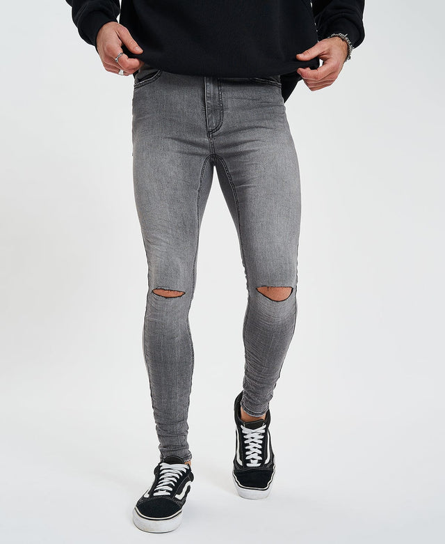 model wears Saint Ultrastretch Jeans Destroyed Gaillon Grey Pants Grey - image 1