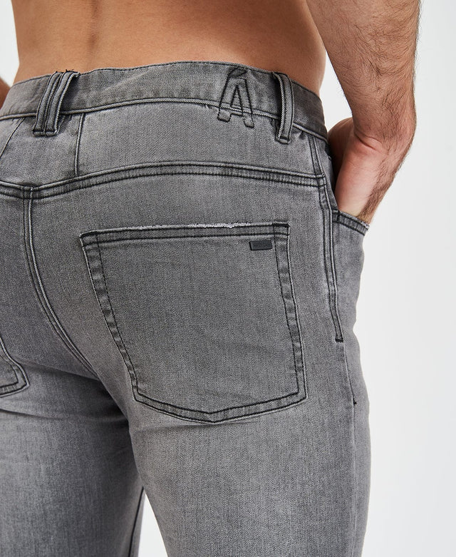 model wears Saint Ultrastretch Jeans Destroyed Gaillon Grey Pants Grey - image 3