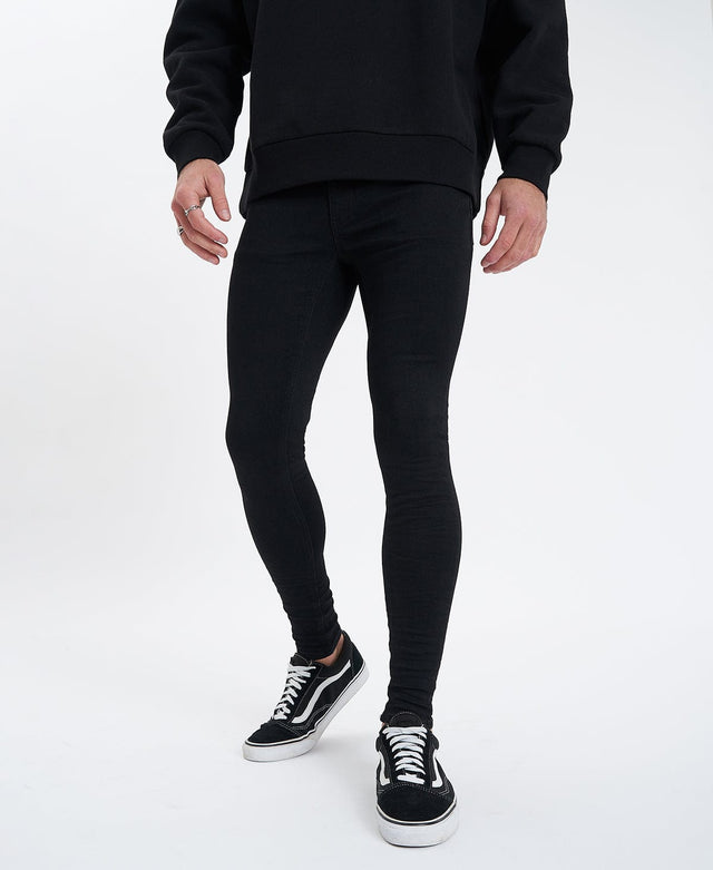 model wears Saint Ultrastretch Jeans True Black Pants Black - image 1