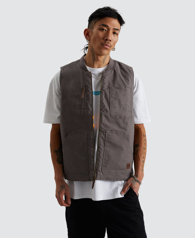 model wears Builders Abraham Reversible Vest Charcoal/ Black Grey Outerwear Grey - image 1