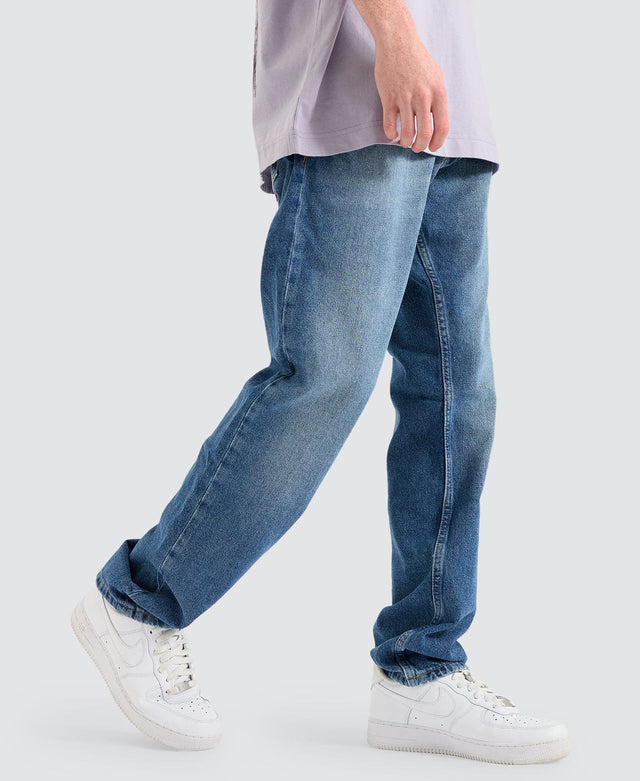 model wears Authentic Straight Denim Jeans Medium Blue Pants Blue - image 4