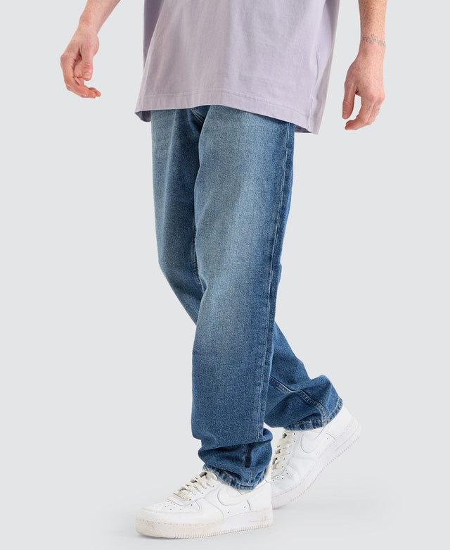 model wears Authentic Straight Denim Jeans Medium Blue Pants Blue - image 3