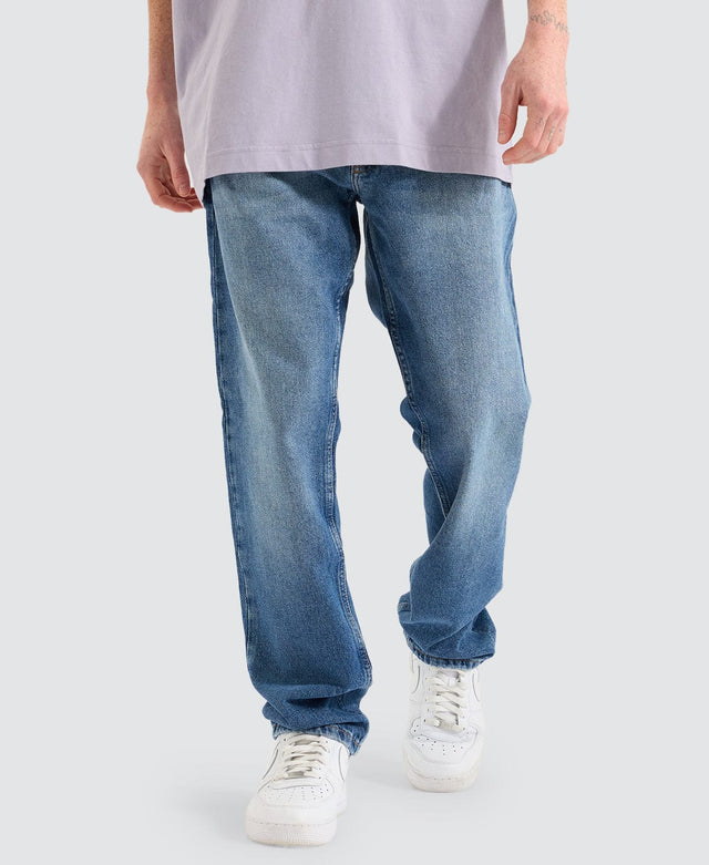 model wears Authentic Straight Denim Jeans Medium Blue Pants Blue - image 1