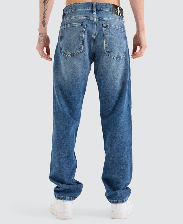 model wears Authentic Straight Denim Jeans Medium Blue Pants Blue - image 7