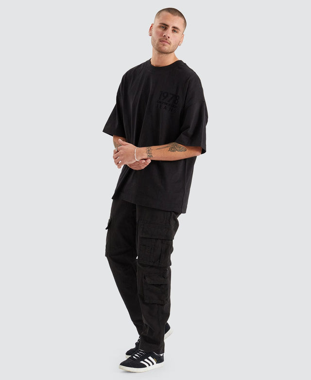model wears Bold Logo Varsity T-Shirt Black T-Shirts Black - image 5