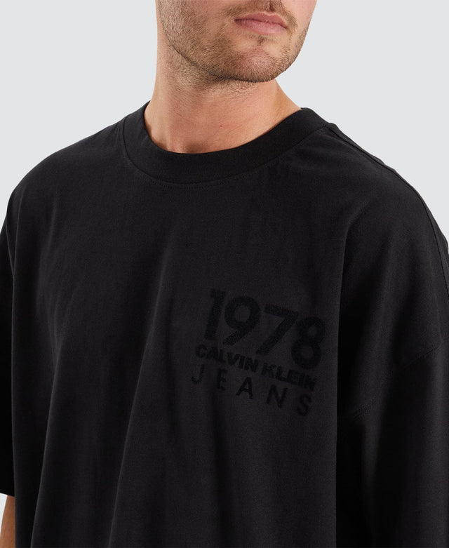 model wears Bold Logo Varsity T-Shirt Black T-Shirts Black - image 2