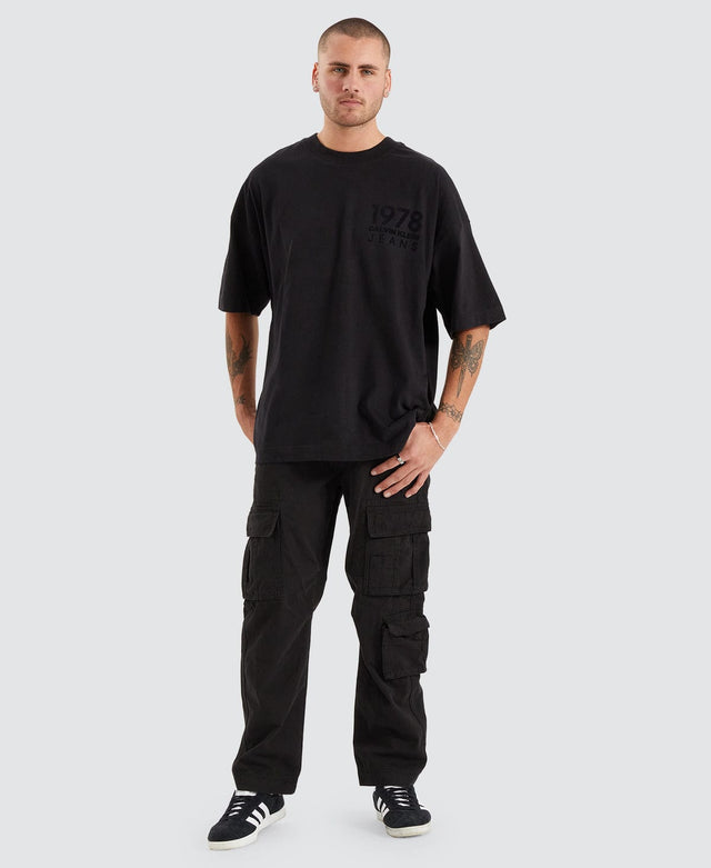 model wears Bold Logo Varsity T-Shirt Black T-Shirts Black - image 4