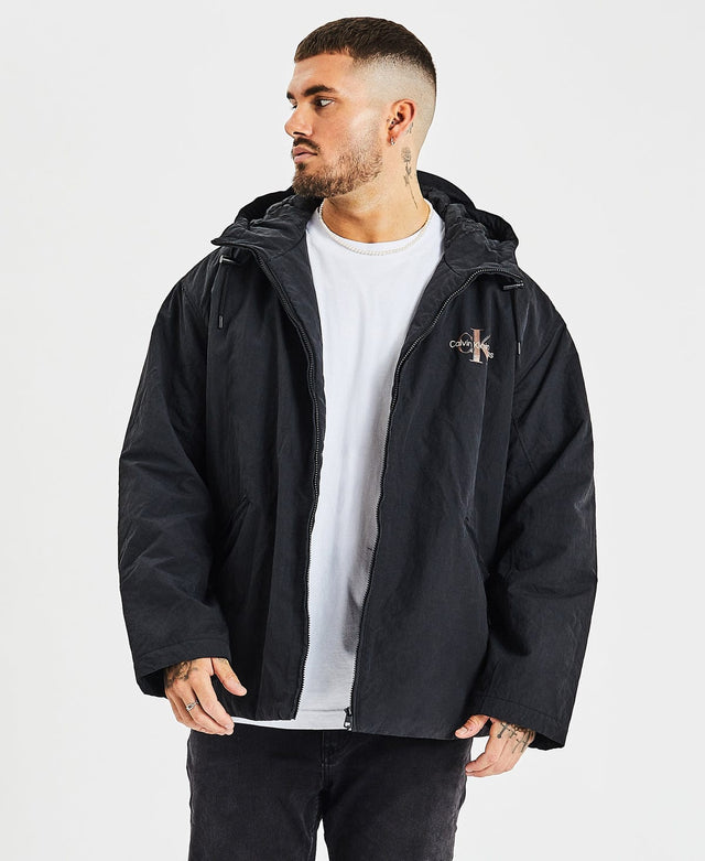 model wears Archival Monologo Windbreaker Jacket Black Outerwear Black - image 1