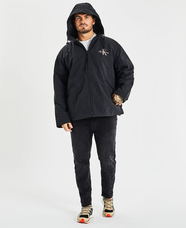 model wears Archival Monologo Windbreaker Jacket Black Outerwear Black - image 5