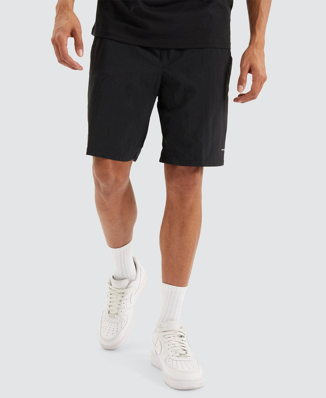 model wears Backcast™ III Water Shorts Black Shorts Black - image 1