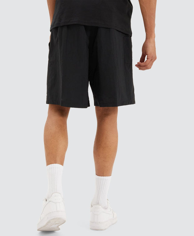 model wears Backcast™ III Water Shorts Black Shorts Black - image 2