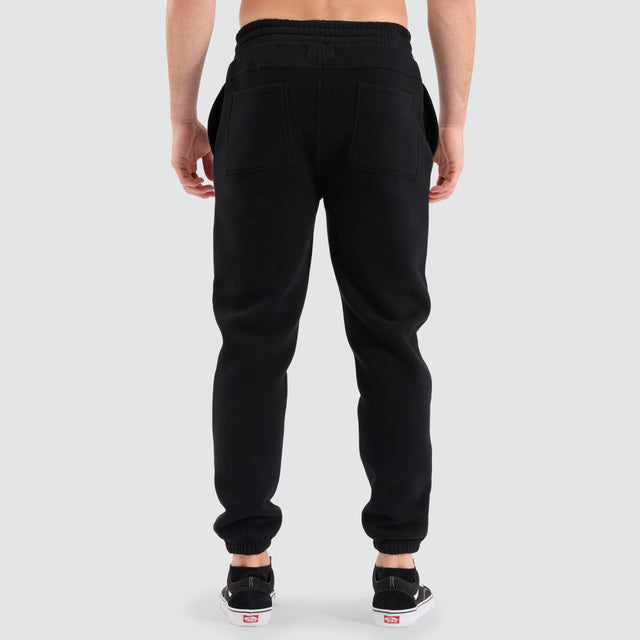 model wears Stanton Heavy Trackpant Jet Black Trackpants Black - image 7