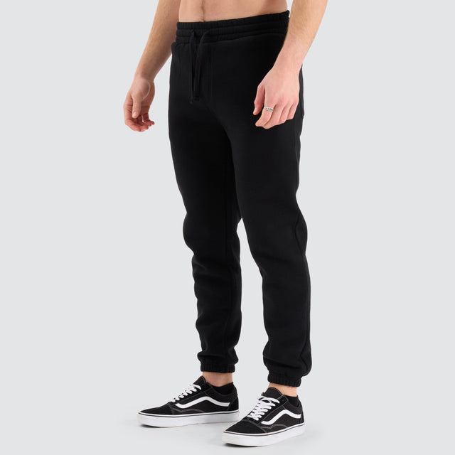 model wears Stanton Heavy Trackpant Jet Black Trackpants Black - image 8